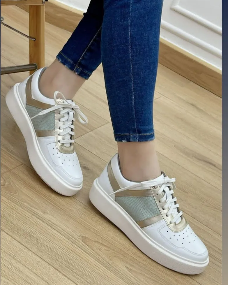 Radiant Charm White Sneakers with Gold Stripe - A Luxurious Blend