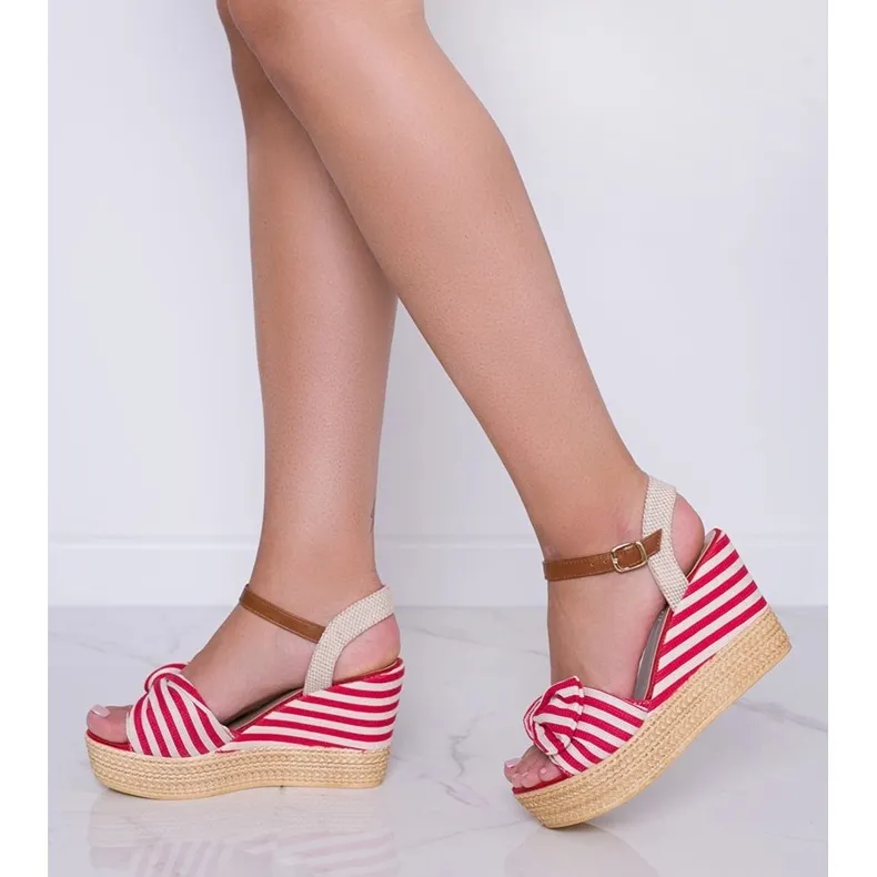 Red and white wedge sandals with a Holiday Vibes bow