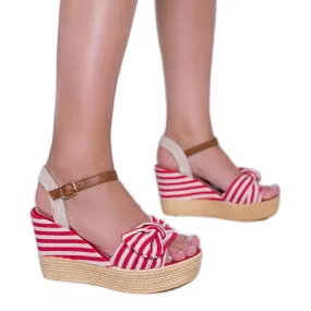 Red and white wedge sandals with a Holiday Vibes bow