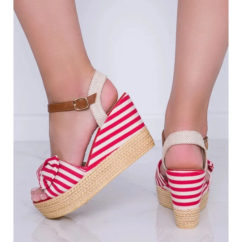 Red and white wedge sandals with a Holiday Vibes bow