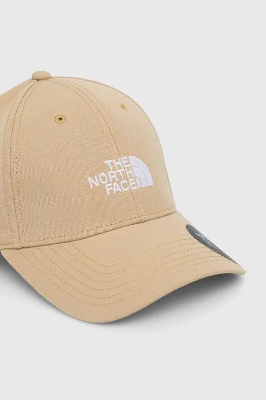 The North Face baseball cap beige color