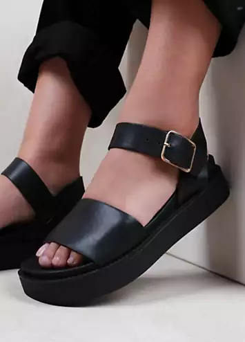 Where’s That From Phoenix Black Buckle Flat Sandals | Grattan